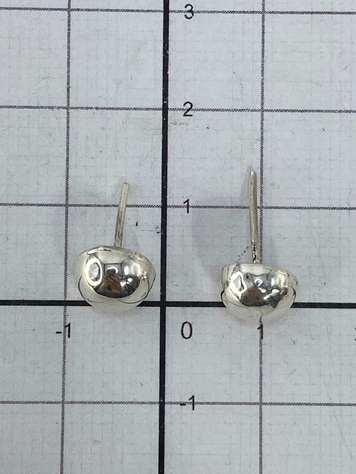 Aretes de plata 925 con Quinto visible en la base