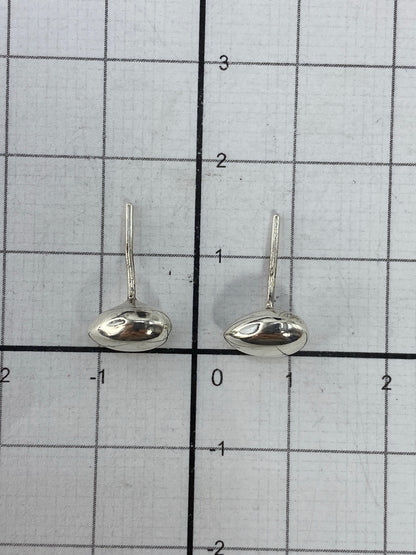 Aretes de plata pura con acabado pulido, listos para envío