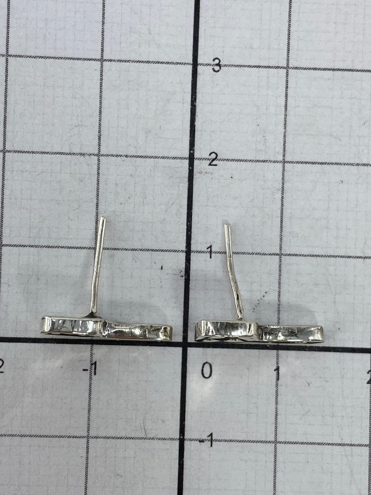 Aretes en estuche de plata con Quinto 925 visible