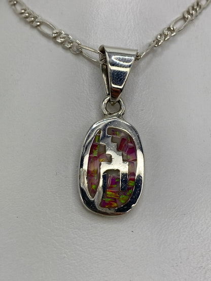 Dije de plata 950 con Ópalo de Fuego rosa, calado geométrico de Taxco