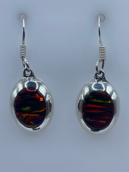 Par de aretes de plata 925 con opalo de fuego multicolor en ton dos brillantes
