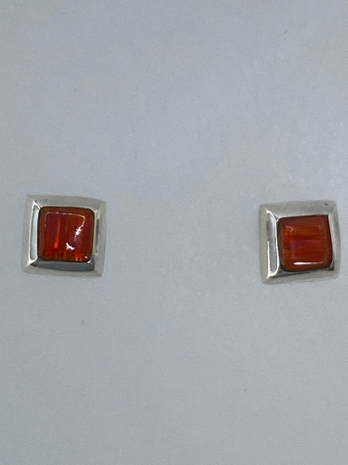 Aretes de ópalo de fuego con Quinto 925 en plata de Taxco