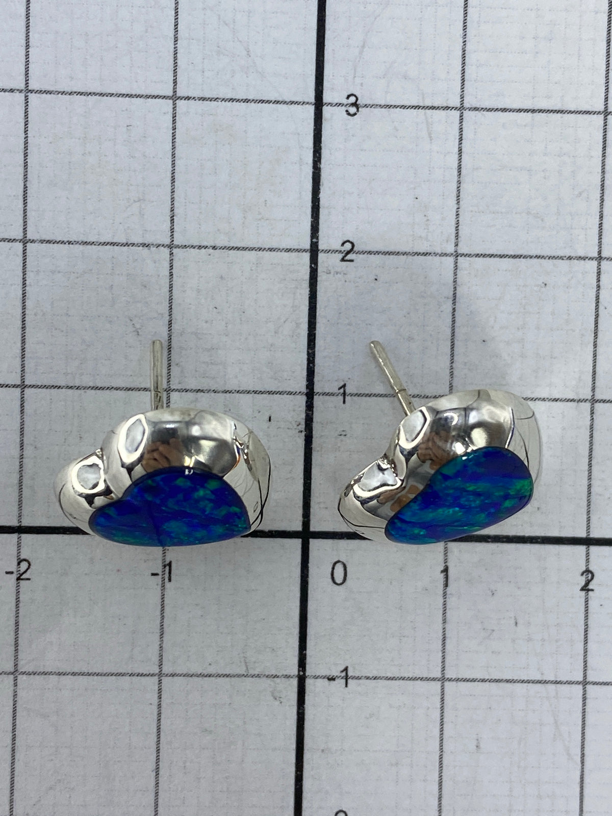 Reverso de los aretes con el Quinto 925 grabado