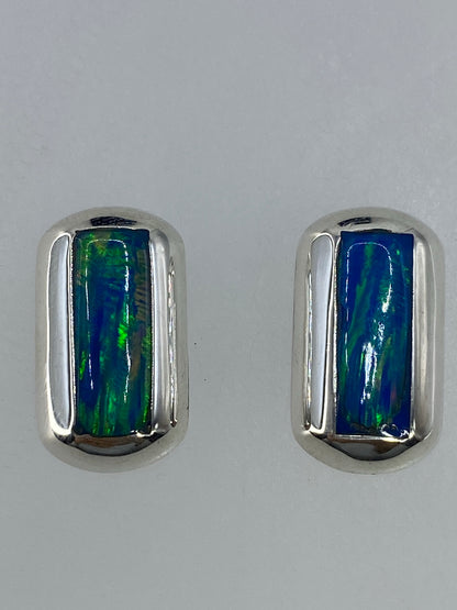 Aretes de plata 925 con ópalo de fuego verde limón engastados a mano en Taxco