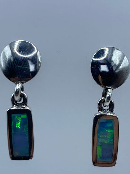 Aretes de plata 950 con cierre de mariposa, vista frontal