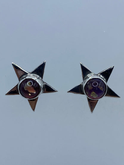 Aretes de plata estrella geométrica minimalista frente a frente