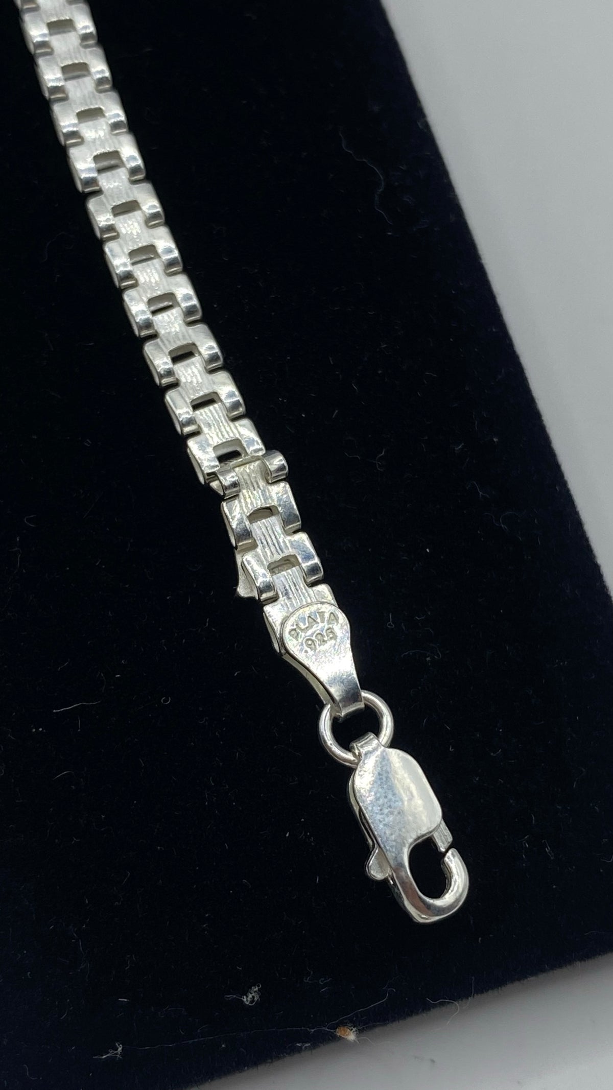 Detalle del eslabón y broche de seguridad de plata con marca .925 TAXCO visible — prueba de autenticidad