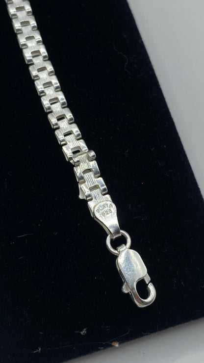 Detalle del eslabón y broche de seguridad de plata con marca .925 TAXCO visible — prueba de autenticidad