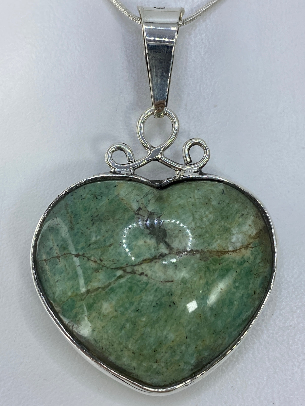 Dije de Plata 950 Corazón con Piedra Verde Olivo — foto 1