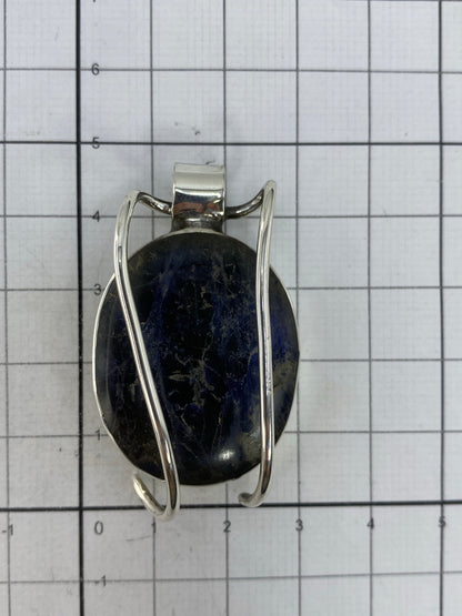 Reverso del dije mostrando el Quinto 925 de autenticidad