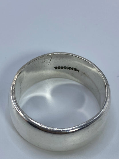 Anillo de plata pura pesando 14.19 gramos en báscula de precisión