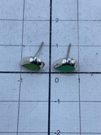 Reverso de los aretes de plata 925 mostrando el acabado pulido y el Quinto de autenticidad