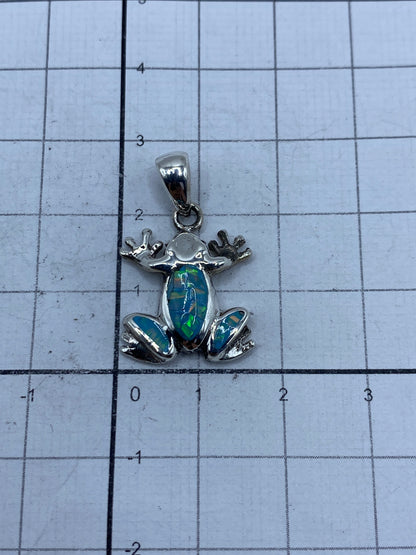 Dije rana de plata 950 en escala de centímetros, 2.8 cm de largo