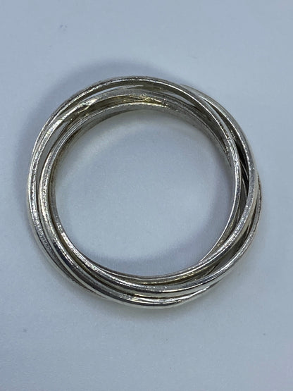 Detalle del entrecruzamiento de las bandas de plata