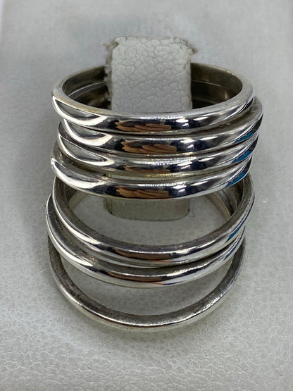Anillo semanario de plata 925 con siete bandas paralelas en talla 5