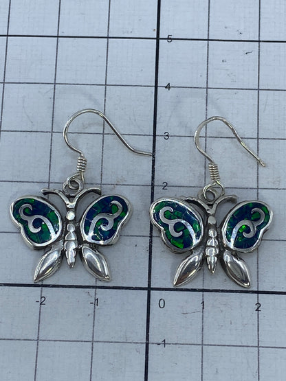 Aretes de plata 950 con gancho, mostrando el Quinto de autenticidad