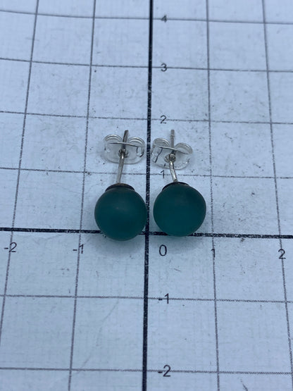 Detalle de la piedra azul pulida en los aretes de Taxco