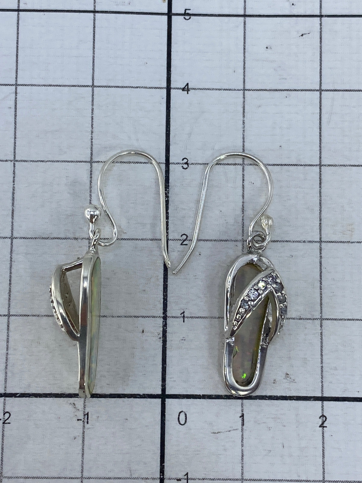 Aretes de plata Taxco 925 con Quinto visible en el gancho
