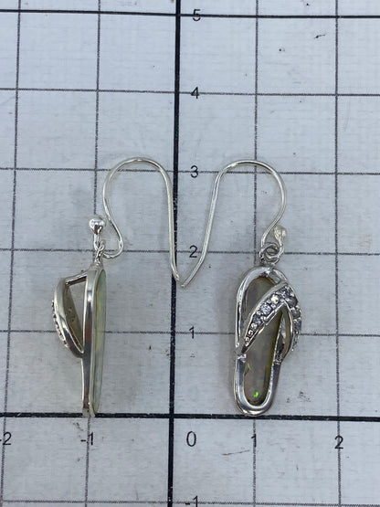 Aretes de plata Taxco 925 con Quinto visible en el gancho