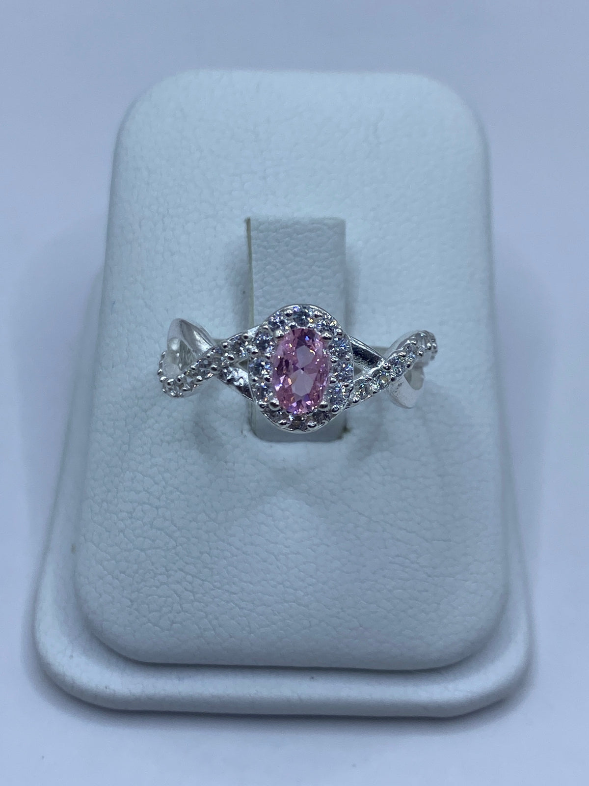 Anillo de plata 925 con circonia rosa central rodeada de micro-circonia blanca