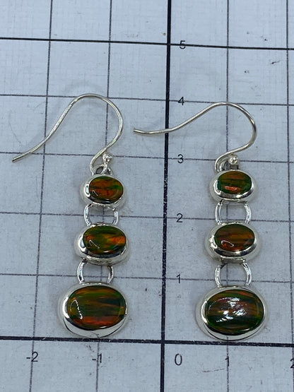 Aretes de 4 cm de largo sobre regla — par completo