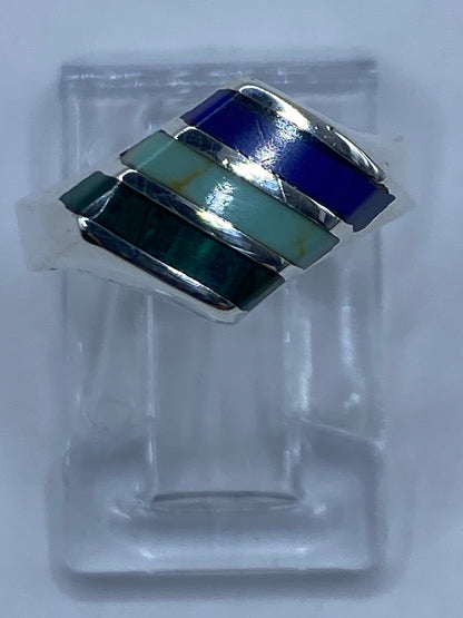 Anillo de plata con turquesa azul cielo y malaquita verde engastadas a mano