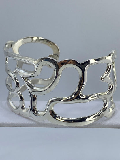 Brazalete calado visto de perfil, ancho de banda 5 cm, pulido brillante
