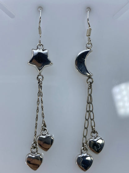 Par de aretes de plata 925 en calado con luna y estrella, largos, colgando