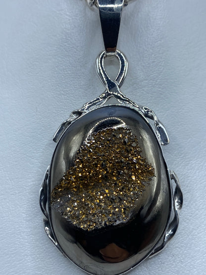 Dije de cuarzo en plata pura con patrón de moteado natural de la piedra