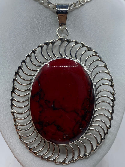 Dije de plata 950 con coral rojo engastado, colgante de filigrana plateada