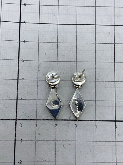 Aretes en caja de regalo azul, listos para obsequiar