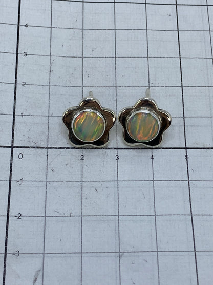 Reverso de los aretes mostrando el Quinto 950 y el hallmark de Taxco
