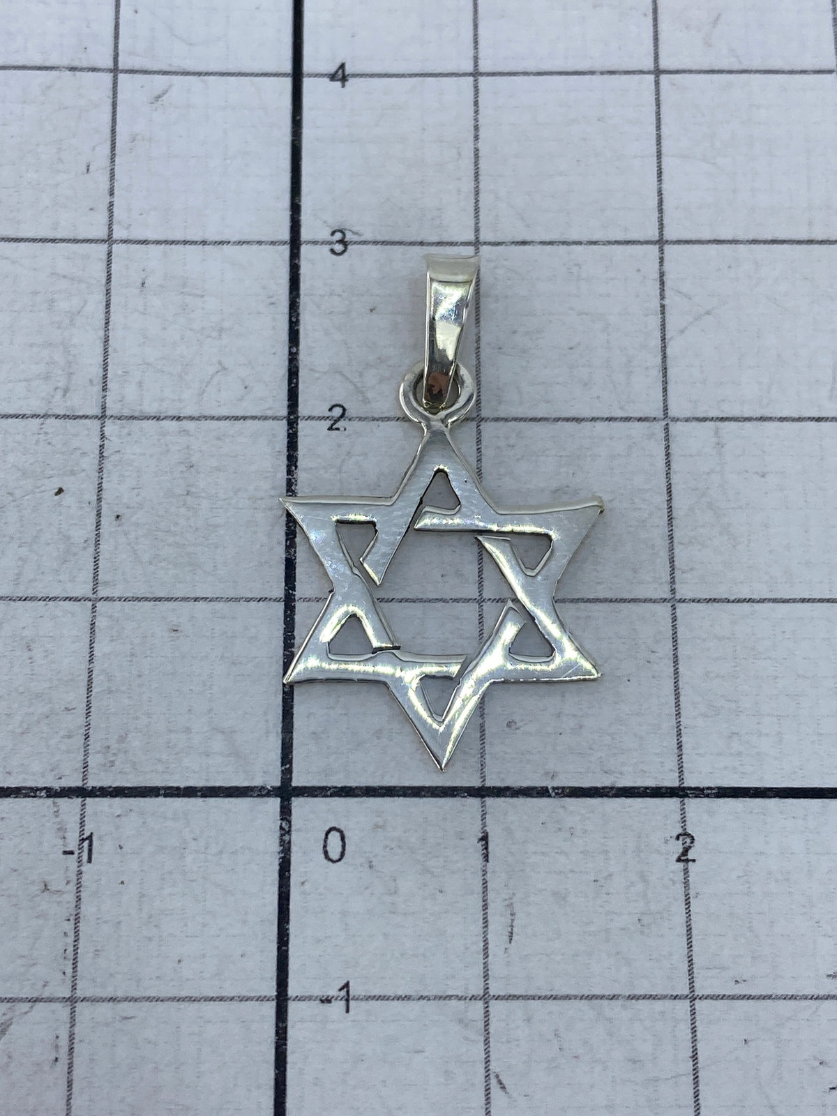 Dije de plata 925 con marca de Quinto Taxco en reverso