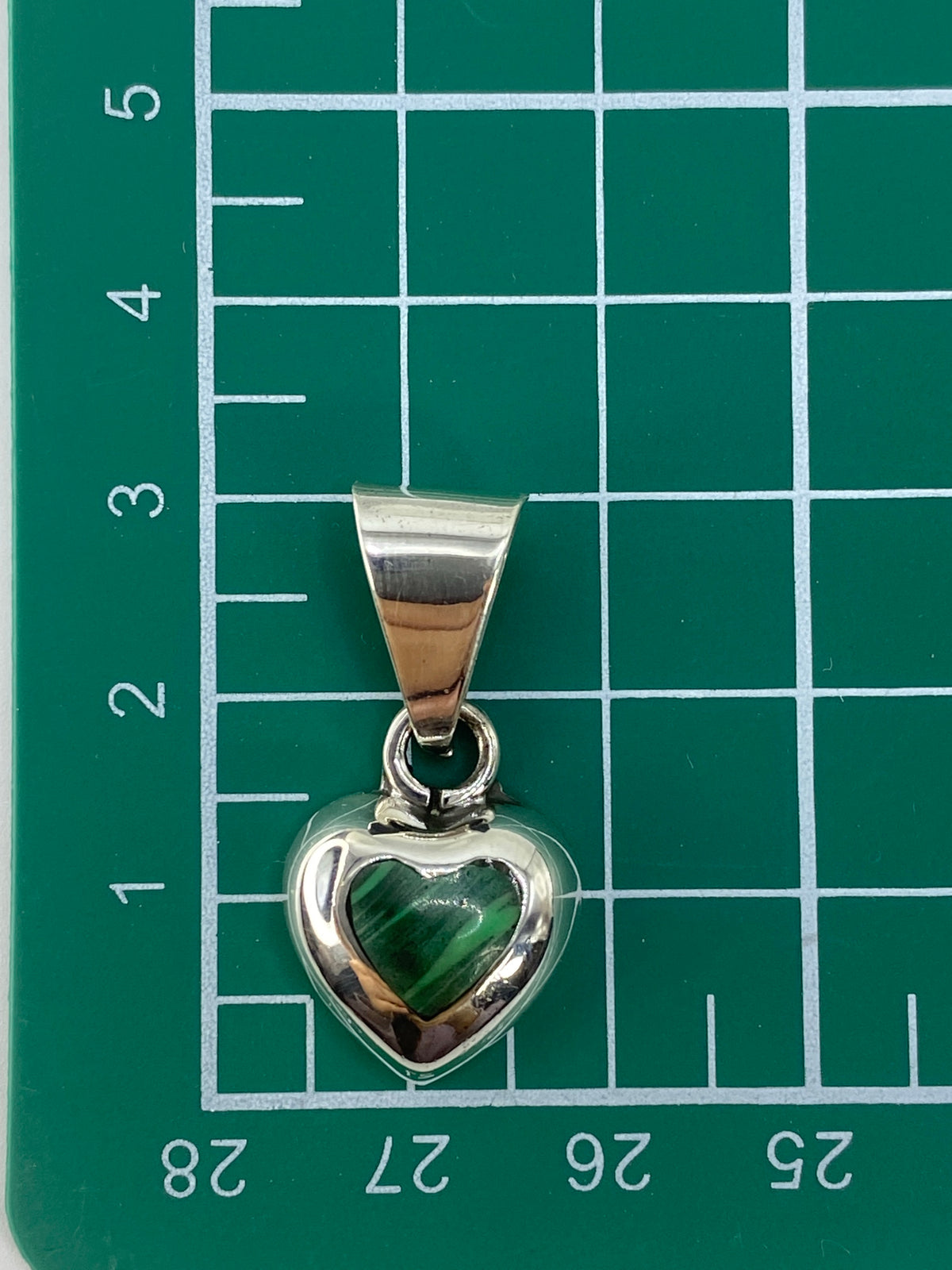 Reverso del dije con el Quinto 925 grabado