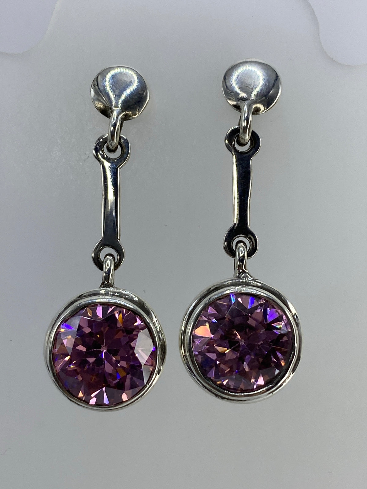Par de aretes de plata 925 con circonia rosa, engastada en Taxco