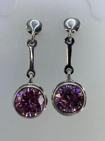 Par de aretes de plata 925 con circonia rosa, engastada en Taxco