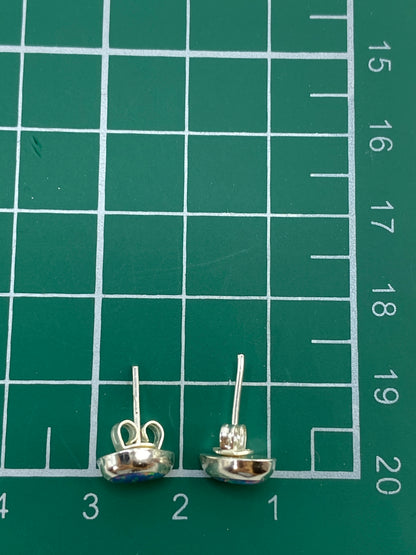 Medida de escala: aretes junto a regla milimetrada