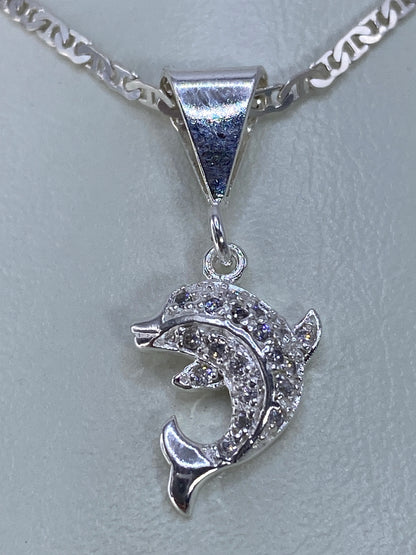 Diye de delfín de Taxco en plata 925, de 2.8 cm, sobre escala de medición