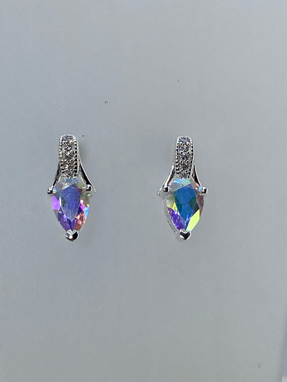Aretes de plata Taxco 925 en escala con regla de centímetros para referencia de tamaño