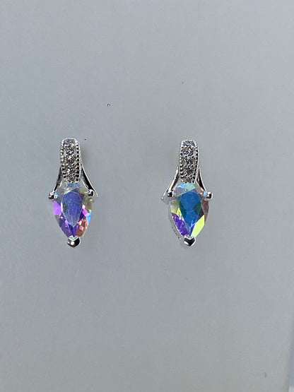 Aretes de plata Taxco 925 en escala con regla de centímetros para referencia de tamaño