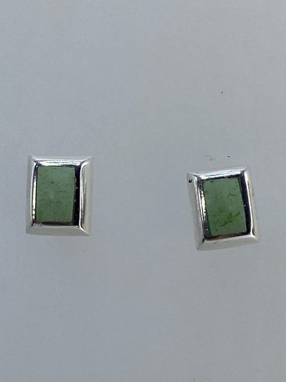 Aretes sobre fondo blanco mostrando el acabado de Taxco