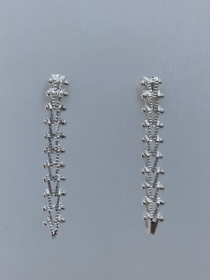 Aretes de plata 925 Taxco vista frontal mostrando el acabado pulido brillante