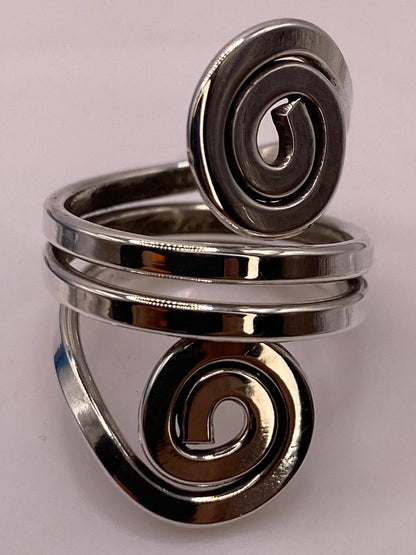 Anillo Ajustable de Plata .925 con Diseño Espiral Doble, sello de autenticidad Plata Ley .925