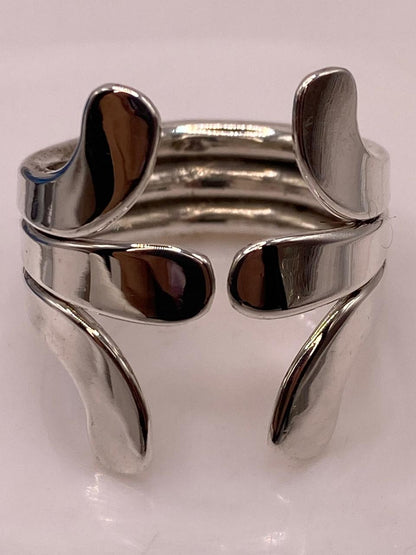 Anillo Ajustable de Plata .925 con Diseño Moderno de Puntas Curvas, sello de autenticidad Plata Ley .925