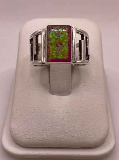 Anillo Ancho con Ópalo de Fuego Rosa, Amarillo y Verde en Plata .950 en báscula mostrando peso
