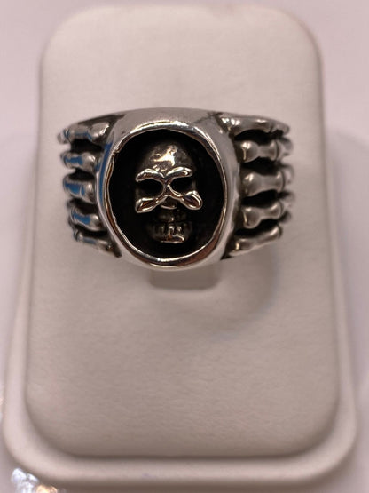 Anillo Artesanal en Plata con Calavera y Banda Estilo Huesos, sello de autenticidad Plata Ley .925