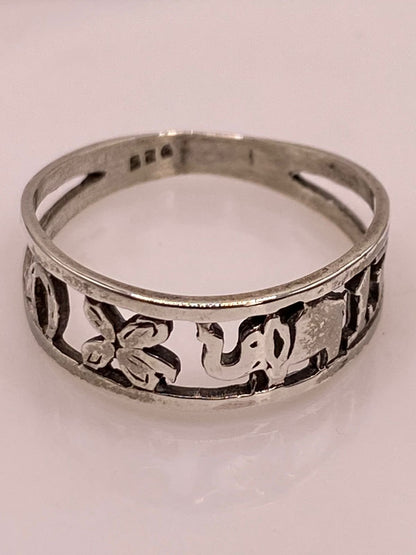 Anillo Artesanal en Plata con Símbolos de la Suerte Calados, sello de autenticidad Plata Ley .925