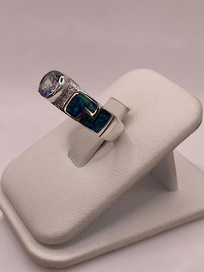 Anillo Artesanal de Plata 950 con Ópalo de Fuego y Zirconia, vista lateral