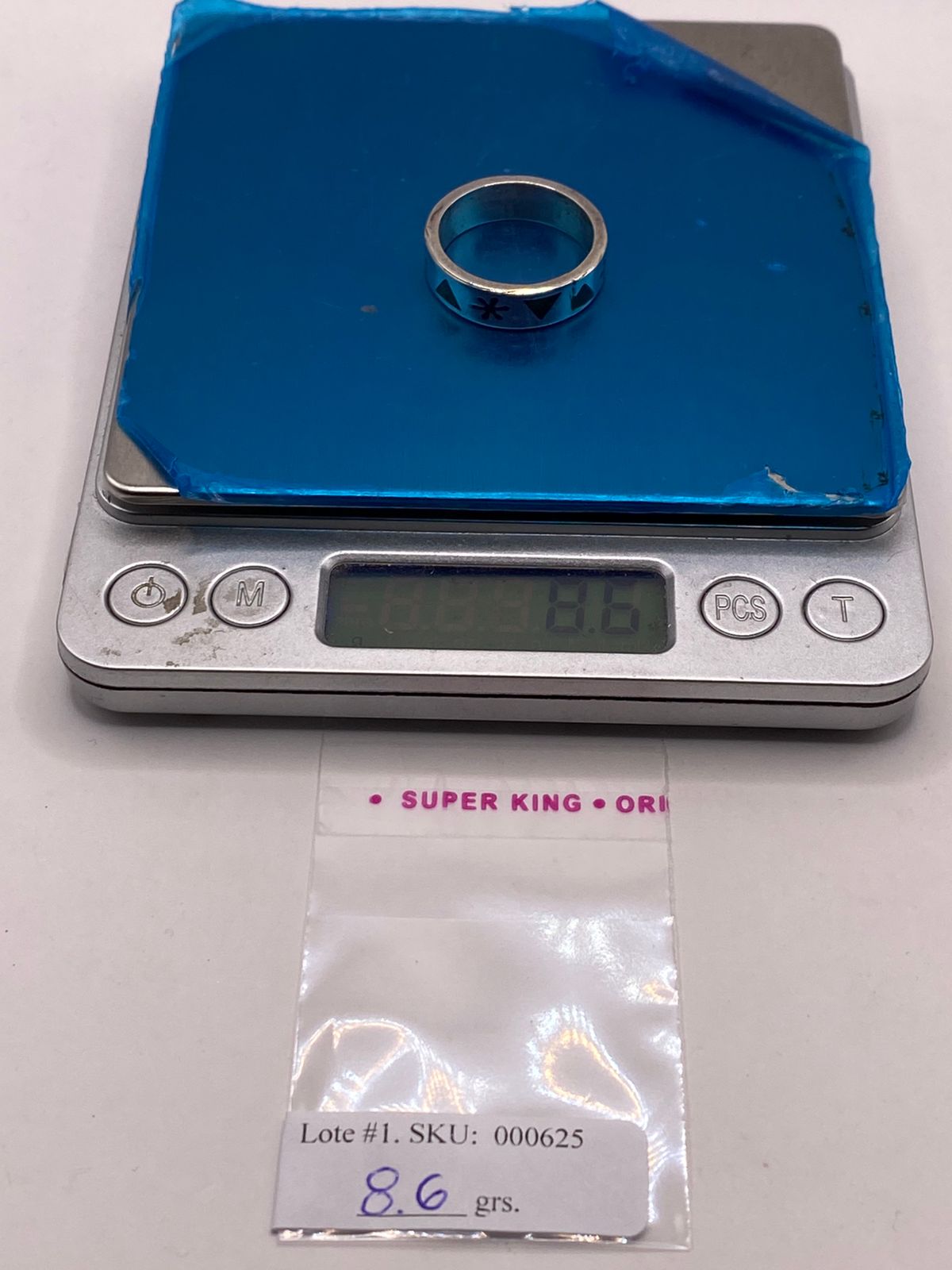 Anillo Artesanal con Triángulos y Flor Esmaltada en Plata, peso en gramos (báscula)