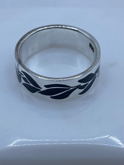 Anillo Artesanal de Plata .925 con Ónix Negro y Diseño de Hoja Calado, sello de autenticidad Plata Ley .925